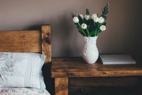 Everything about Eurail | Bed and flowers in a room